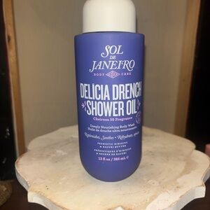 Sol de Janeiro Delicia Drench Shower Oil in Purple Bottle